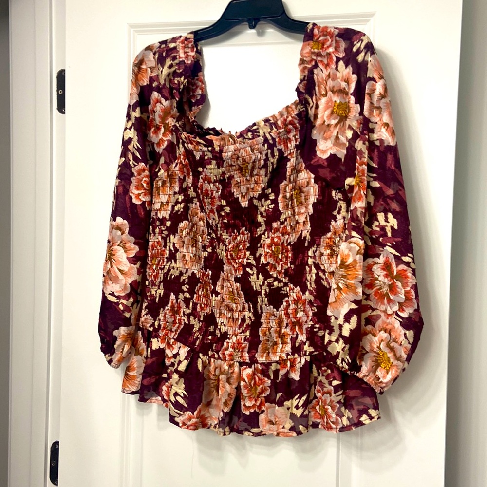 Bought the shirt at Maurices it fits a little bigger than an extra large.